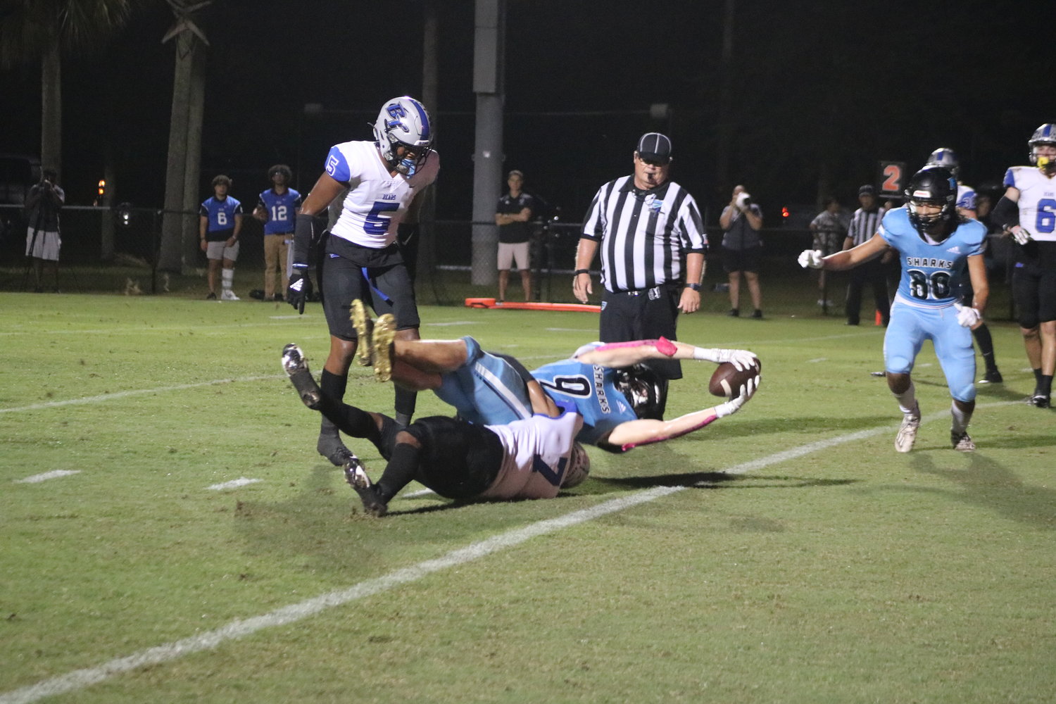 Ponte Vedra’s Luke Pirris reaches across the goal line for one of two receiving touchdowns against Bartram Trail Oct. 8. Consistency is key to sustained success for the Sharks.